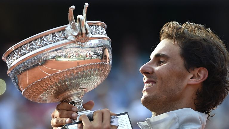Rafael Nadal with the trophy after winning his ninth French Open title