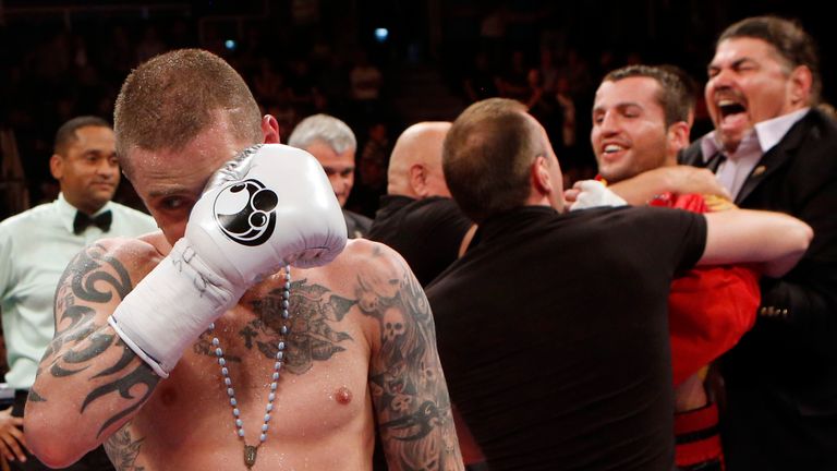 Ricky Burns looks dejected after his defeat to Dejan Zlaticanin at the Braehead Arena, Glasgow