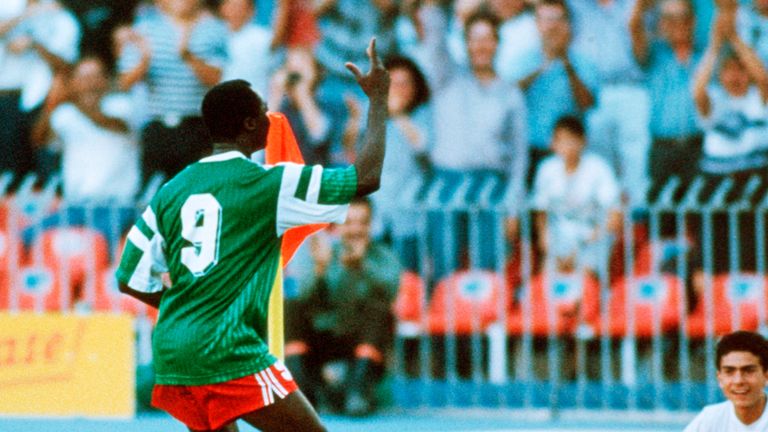 Roger Milla of Cameroon celebrates scoring his first goal during the World Cup eighth final match between Cameroon and Colombia