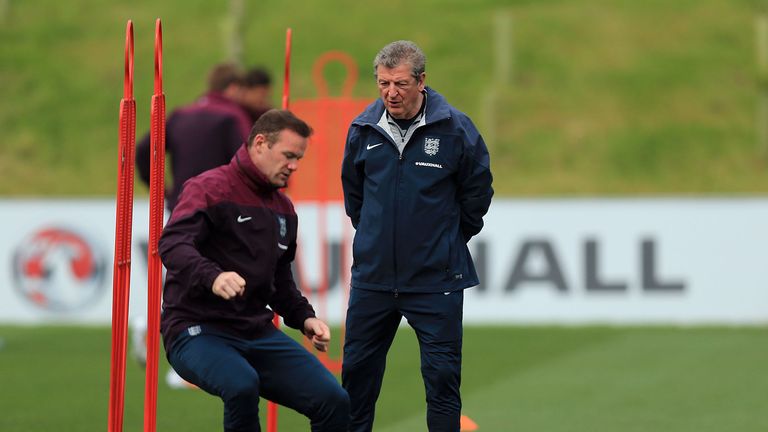 England manager Roy Hodgson watches Wayne Rooney during a media day at St George's Park