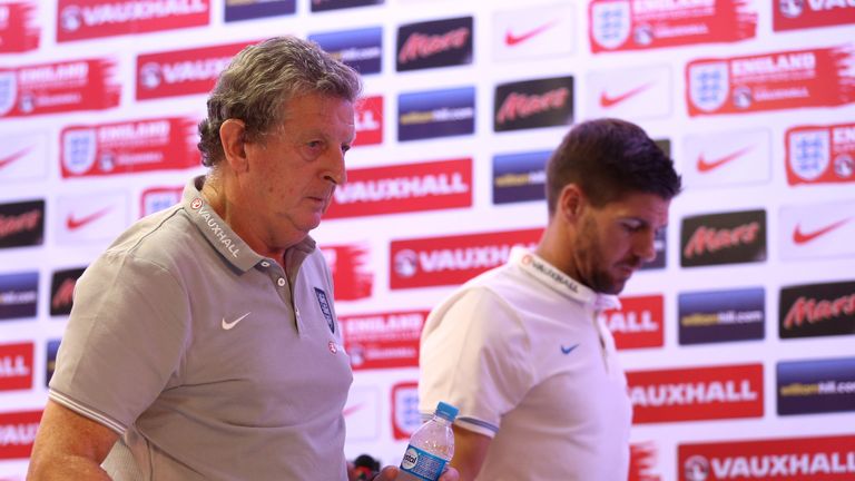 Roy Hodgson and Steven Gerrard exit a press conference at Urca Military Training Ground, Rio de Janeiro, Brazil.