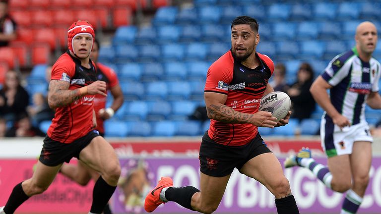 Salford Red Devils' Rangi Chase goes over for a try against Bradford Bulls, during the First Utility Super League match at Salford City Stadium, Salford. P