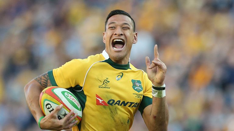 Israel Folau of the Wallabies celebrates as he runs in to score a try during the International Test match between Australia and France