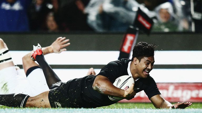 Julian Savea of the All Blacks dives in to score his second try during the International Test match between New Zealand and England