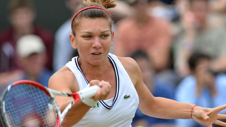 Romania's Simona Halep hits a return against China's Li Na during their second round women's singles match