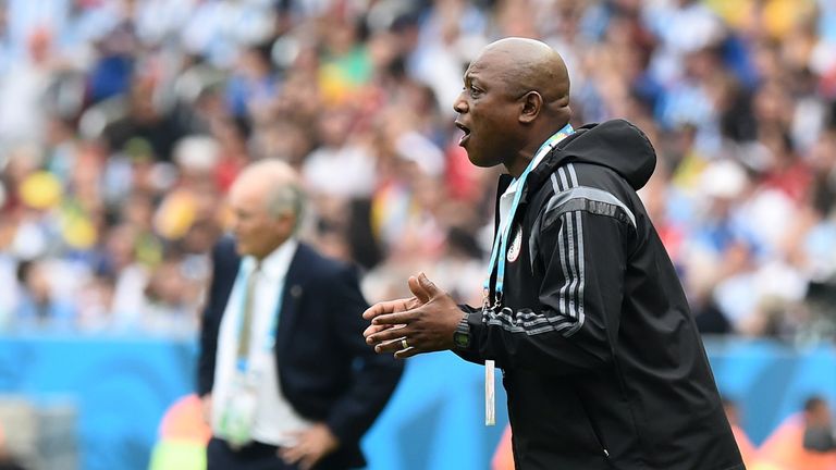 Nigeria's coach Stephen Keshi gestures as Argentina's coach Alejandro Sabella looks on during the Group F football match between Nigeria and Argentina