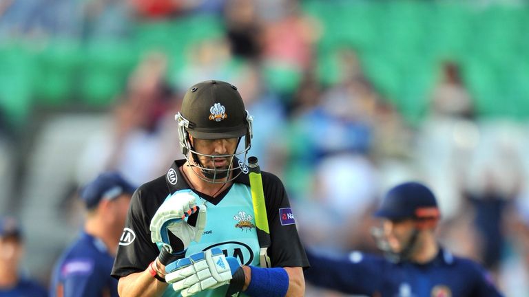 Surrey's Kevin Pietersen leaves the pitch after being caught by Essex's Ryan Ten Doeschate off the bowling of Ravi Bopara for 5 runs during the T20 cricket