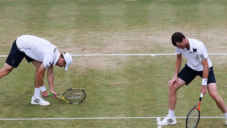 LONDON, ENGLAND - JUNE 15:  Jamie Murray of Great Britain and John Peers (white cap) of Australia in action against Alexander Peya of Austria and Bruno Soa