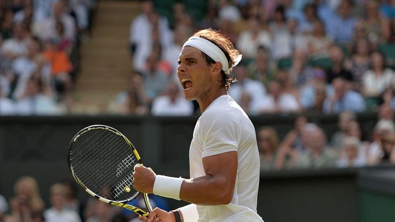 Spain's Rafael Nadal celebrates defeating Slovakia's Martin Klizan during day two of the Wimbledon Championships at the All England Lawn Tennis and Croquet
