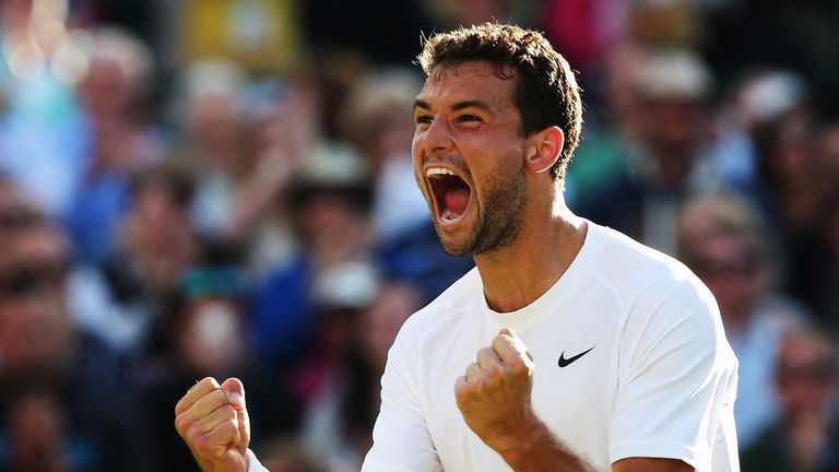Grigor Dimitrov of Bulgaria celebrates after winning his Gentlemen's Singles third round match against Alexandr Dolgopolov at Wimbledon 2014