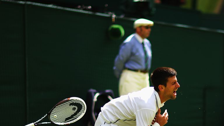 Novak Djokovic takes a tumble during Wimbledon third round clash with Gilles Simon 2014