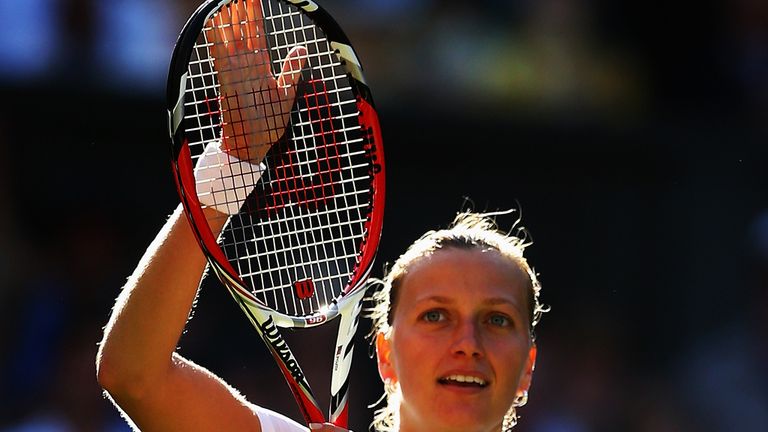 Petra Kvitova of Czech Republic celebrates defeating Venus Williams of the United States in their Ladies' Singles third round match at Wimbledon 2014