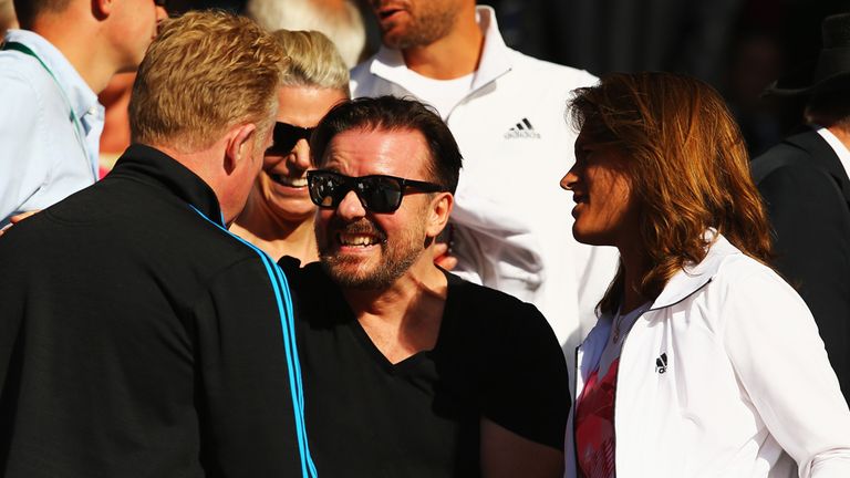 Actor Ricky Gervais in the crowd with Andy Murray of Great Britain's coach Amelie Mauresmo at Wimbledon 2014