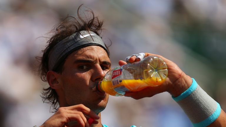 PARIS, FRANCE - JUNE 08:  Rafael Nadal of Spain drinks during a break in his men's singles final match against Novak Djokovic of Serbia on day fifteen of t
