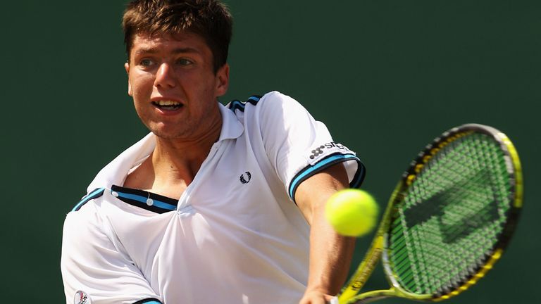 LONDON, ENGLAND - JUNE 27:  Oliver Golding of Great Britain in action during his first round boy's match against  Aslan Karatsev of Russia on Day Seven of 