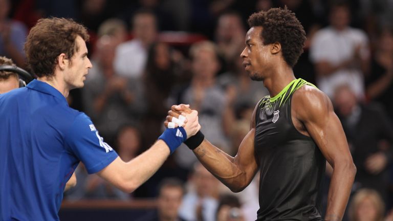 PARIS - NOVEMBER 12:  Gael Monfils (r) of France shakes hands with Andy Murray (l) of Great Britain after his 6-2,2-6, 6-3 quarter-final victory during Day