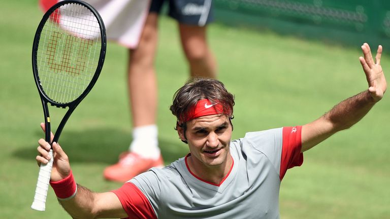 HALLE, GERMANY - JUNE 12:  Roger Federer of Switzerland celebrates after winning his match against Joao Sousa of Portugal during day four of the Gerry 