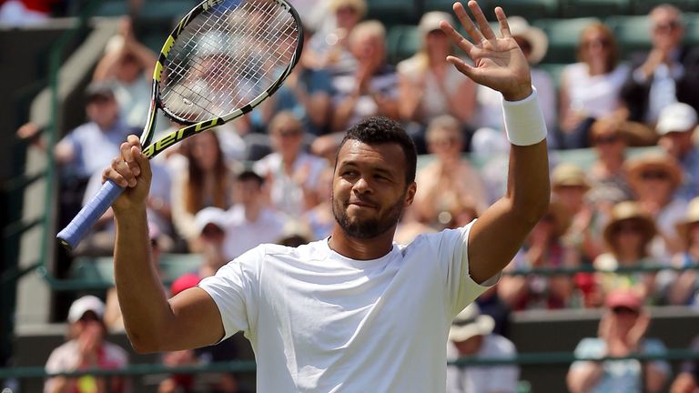 France's Jo-Wilfried Tsonga celebrates beating Austria's Jurgen Melzer during day two of the Wimbledon Championships