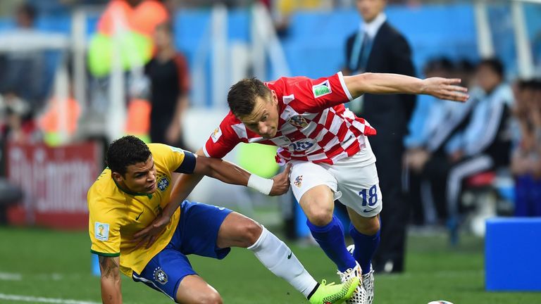 Ivica Olic of Croatia battles with Thiago Silva of Brazil during the 2014 FIFA World Cup Brazil Group A match