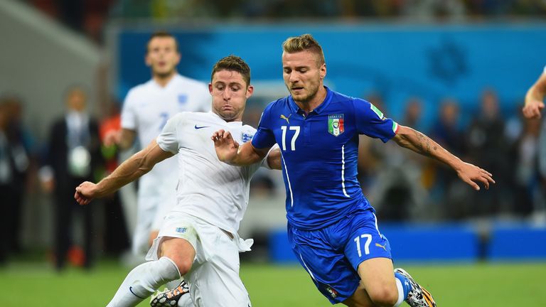 Gary Cahill of England tackles Ciro Immobile of Italy during the 2014 FIFA World Cup Brazil Group D match
