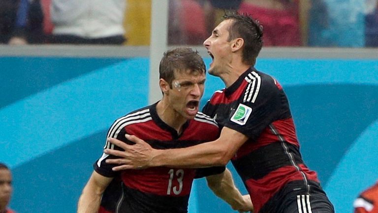 Germany's Thomas Muller celebrates with his teammate Miroslav Klose