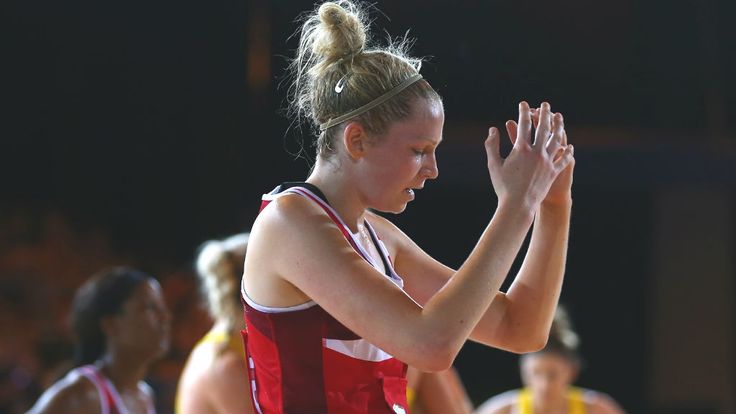 Joanne Harten of England is dejected after England were defeated by Australia during the Pool B netball match