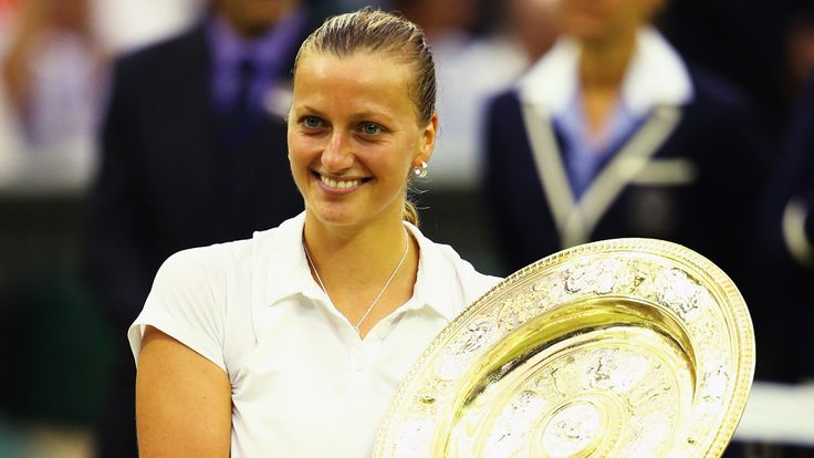 LONDON, ENGLAND - JULY 05:  Petra Kvitova of Czech Republic poses with the Venus Rosewater Dish trophy after her victory in the Ladies' Singles final match