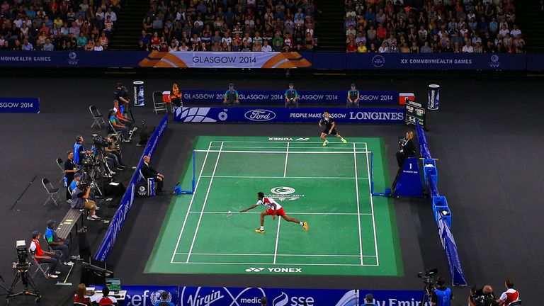 England's Rajiv Ouseph competes in the men's singles badminton match with Malaysia's Chong Wei Feng during the team gold medal event, at the Emirates Arena