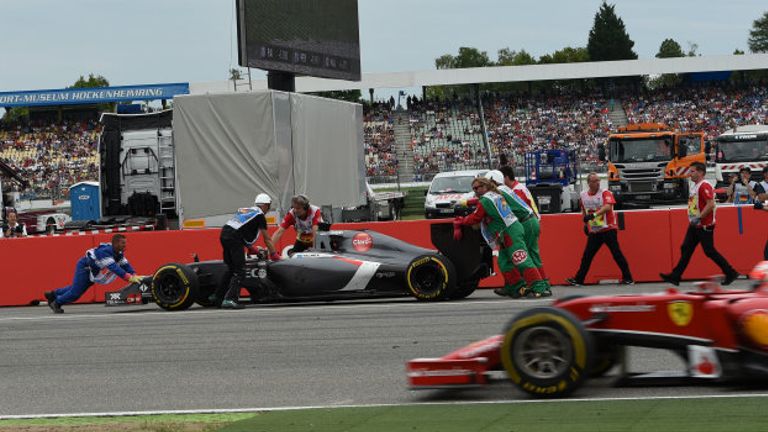 Marshals recover Adrian Sutil's stricken Sauber