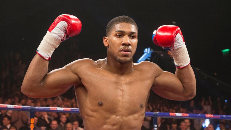 Anthony Joshua celebrates beating Hector Avila during their Heavyweight bout at the SECC, Glasgow.