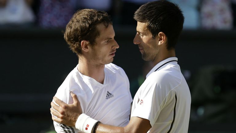 Britain's Andy Murray (L) embraces Serbia's Novak Djokovic (R) after Murray's victory in the 2013 men's Wimbledon final
