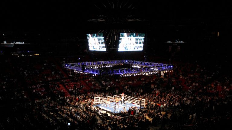Ray Austin fights against Odlanier Solis during the WBC Heavyweight Final Championship Elimination bout  at American Airlines Arena