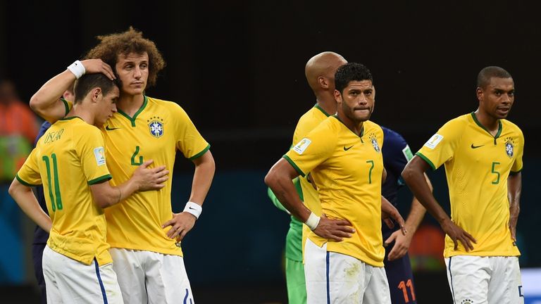  Brazil's midfielder Oscar, David Luiz, Hulk and Fernandinho react at the end of the third place play-off football match between Brazil and Netherlands.