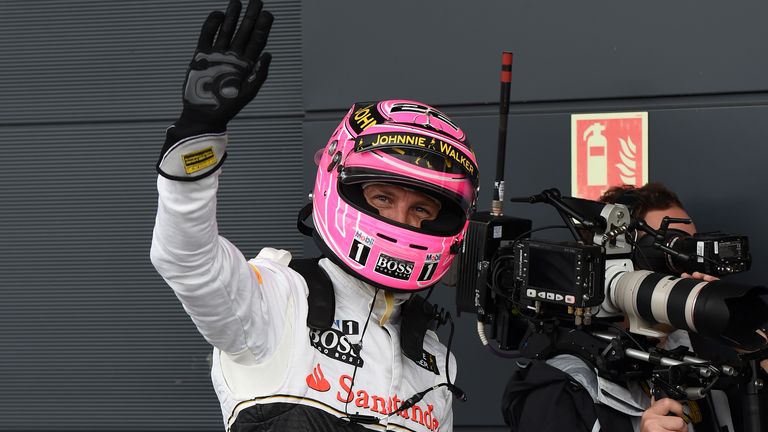Jenson Button waves to the crowd