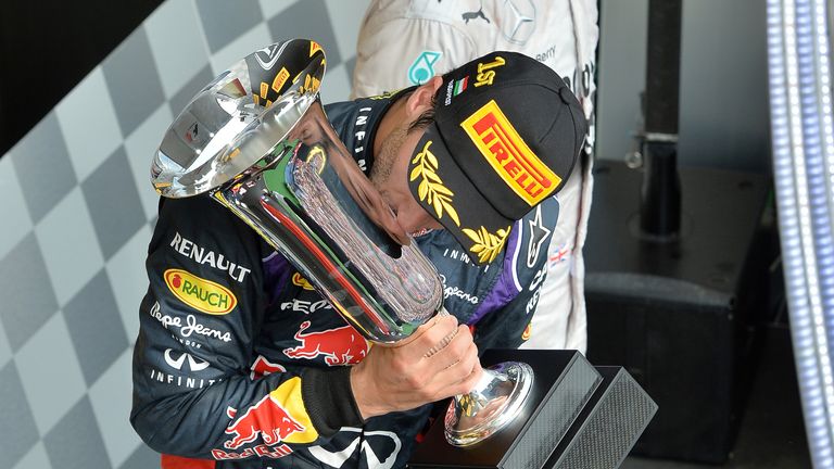 Daniel Ricciardo kisses the trophy