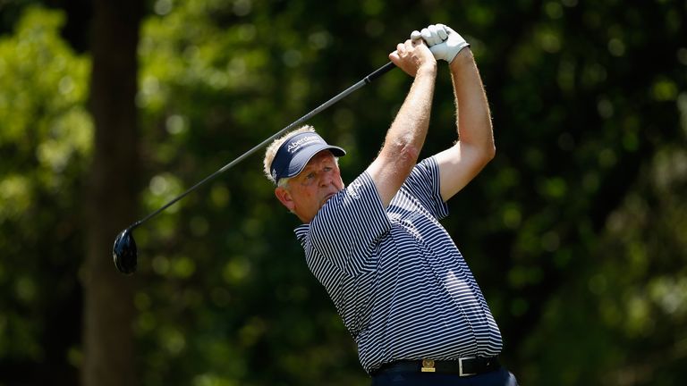Colin Montgomerie of Scotland hits his tee shot on the fifth hole during the first round of the 2014 U.S. Senior Open Championship 