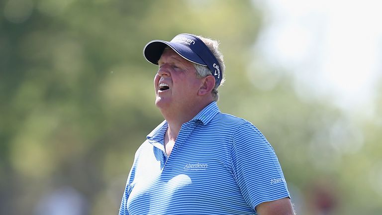 Colin Montgomerie reacts to a missed putt on the 11th green during the second round of the 2014 US Senior Open