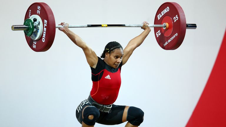 Dika Toua of Papa New Guinea competes in the Women's 53kg Group A Weightlifting