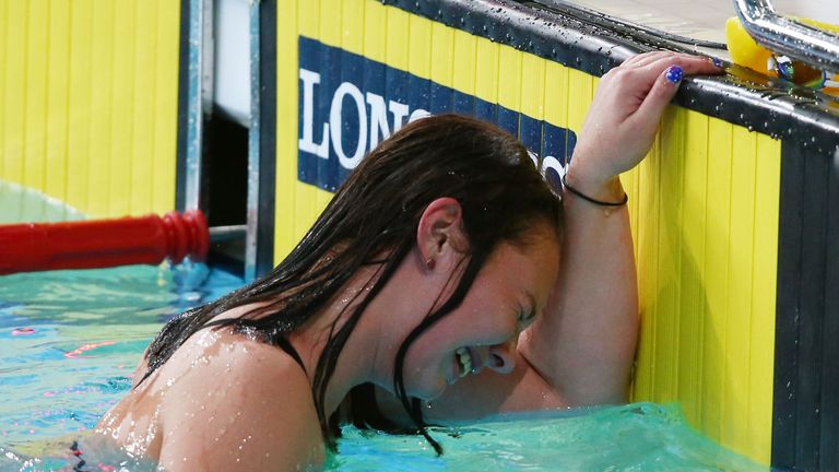 Maddison Elliott of Australia celebrates after winning the gold medal in the women's 100m freestyle S8 final in a new world record time