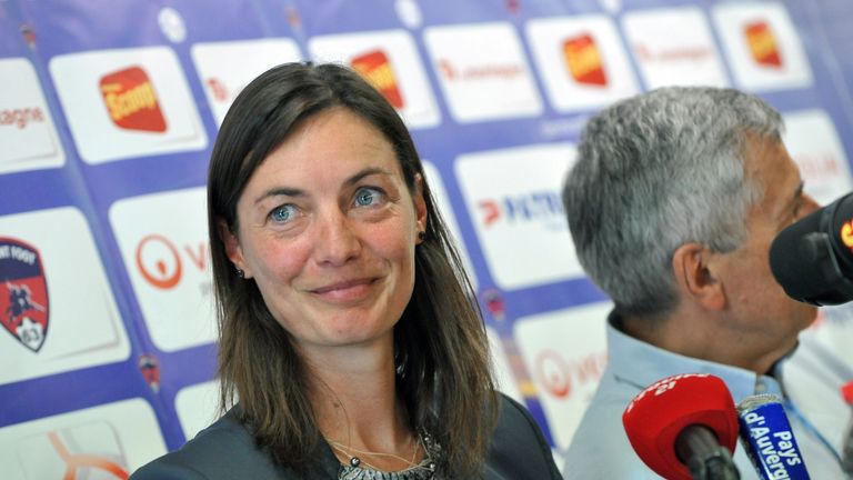 Corinne Diacre, the former captain of the French national women's football team, smiles at a Clermont Foot press conference