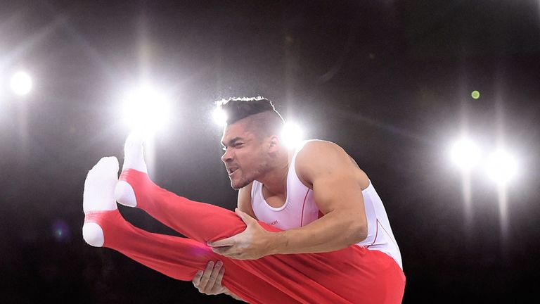 England's Louis Smith performs on the parallel bars in the Team Final and individual qualification at the SSE Hydro, during the 2014 Commonwealth Games in 