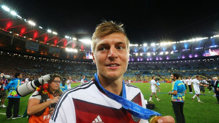 RIO DE JANEIRO, BRAZIL - JULY 13: Toni Kroos of Germany celebrates with his medal after defeating Argentina 1-0 in extra time during the 2014 FIFA World Cu