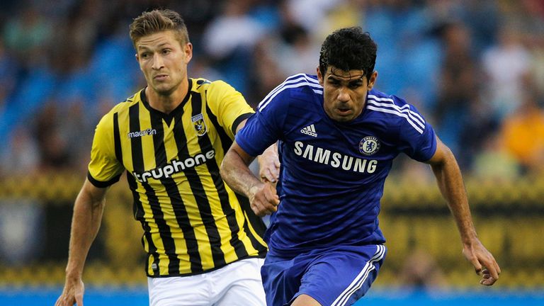 Diego Costa of Chelsea gets past Jan Arie van der Heijden of Vitesse during the pre season friendly on July 30