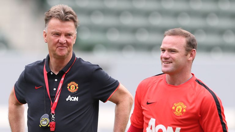 Manager Louis van Gaal and Wayne Rooney of Manchester United in action during training