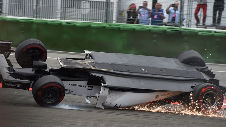 Felipe Massa crashes and rolls at the start of the race