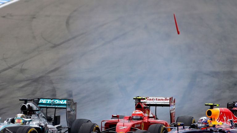 Lewis Hamilton, Kimi Raikkonen and Daniel Ricciardo battle