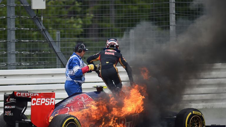 Daniil Kvyat's car bursts into flames