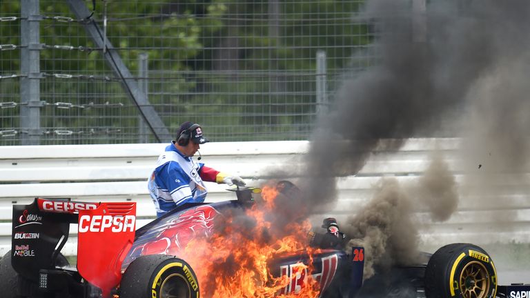 Daniil Kvyat's car bursts into flames