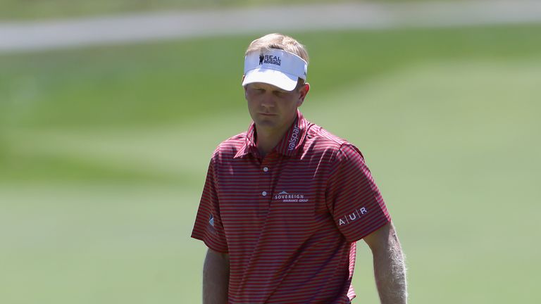 Billy Hurley III reacts to a missed putt on the second green during the third round of the Greenbrier Classic 