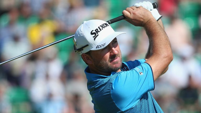 Graeme McDowell of Northern Ireland hits his tee shot on the fourth hole during the first round of The 143rd Open Championship